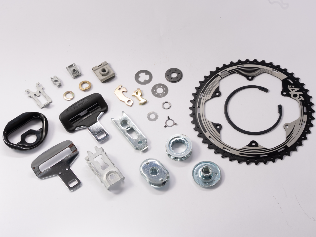 Stamped and fine-blanked brackets, clips, latches and retaining parts